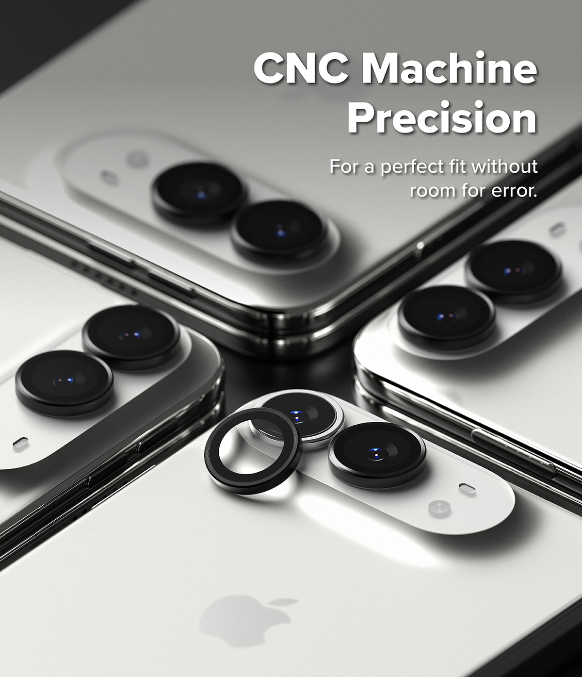 iPhone Duo Camera Protector | Camera Lens Frame Glass (2 Pack) - Close-up of several silver smartphones arranged diagonally, each showing a black camera lens protector ring and matching camera bar accessory. White text at the top reads 'CNC Machine Precision' with smaller supporting text about perfect fit.