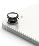 iPhone 17e / 16e | Camera Lens Frame Glass - iPhone 17e / 16e - Protective glass lens cover hovering above the rear camera of a white smartphone.