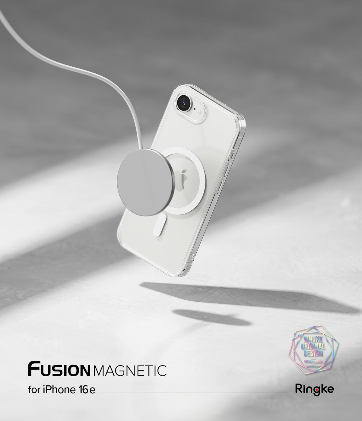 iPhone 16e Case | Fusion Magnetic - Clear phone case on an iPhone 16e being charged by a magnetic wireless charger.