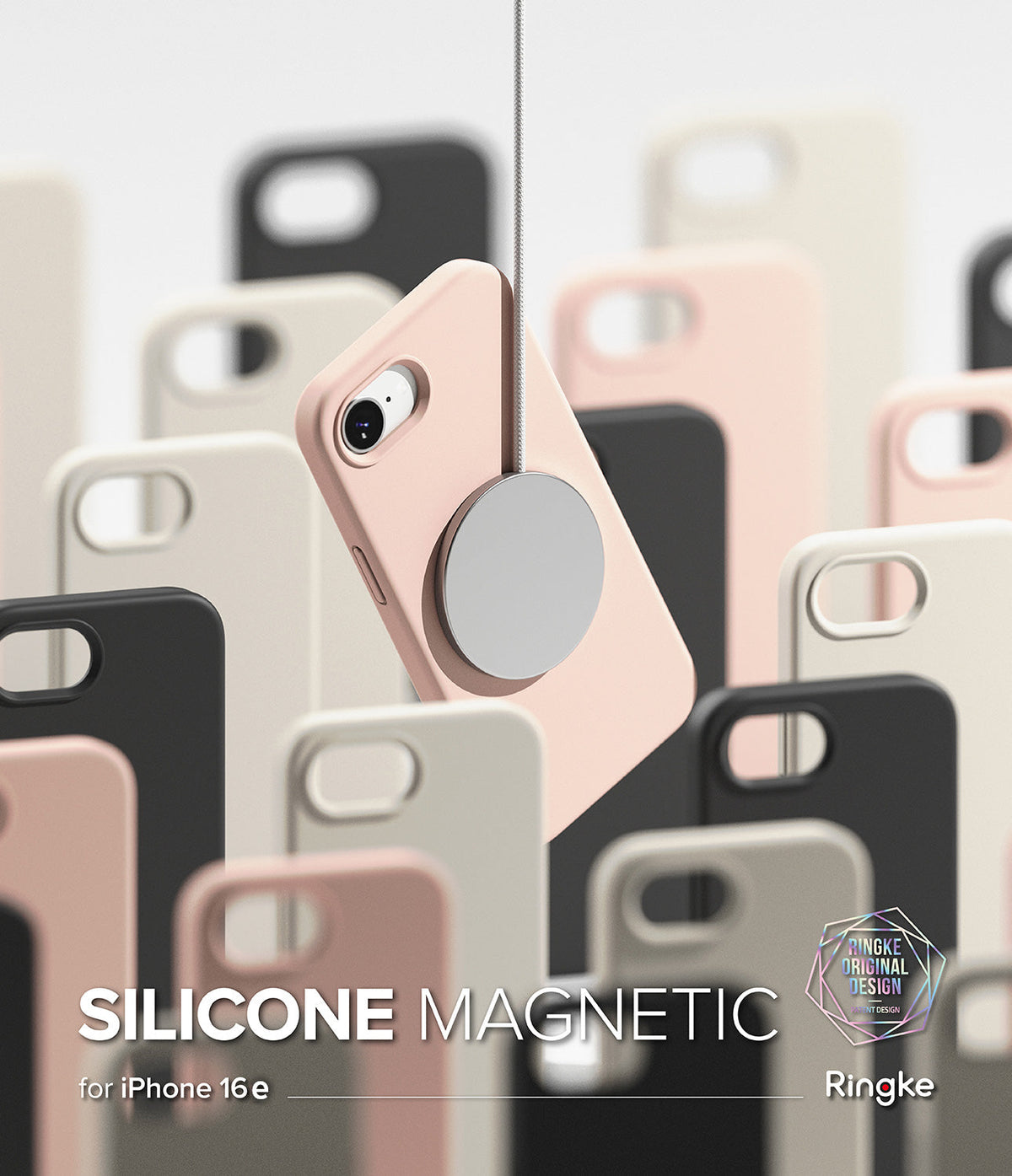 iPhone 16e Case | Silicone Magnetic - A pink magnetic phone case suspended by a charger among various colored silicone cases.