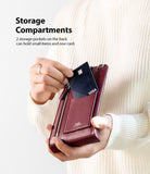 Mini Cross Bag | PU Leather - Mini Cross Bag - Person inserting a credit card into the back pocket of a burgundy PU leather mini crossbody bag.