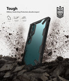 Mi Note 10 / 10 Pro Case | Fusion-X - Rugged black phone case with clear back, shown hitting dirt with debris flying.
