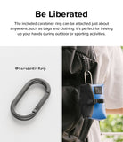 Mini Pouch Tarpaulin | Roll Top - A metal carabiner ring and a blue roll-top pouch clipped to a black backpack.