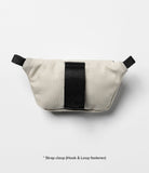 Mini Pouch | Sling Bag - Off-white fabric pouch with a central black vertical strap and small black side loops on a white background.