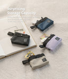 Mini Pouch | 2-Way Bag Miniature - Four small, colorful zippered pouches arranged on a textured surface, holding cards and snacks.