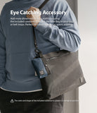Mini Pouch | 2-Way Bag Miniature - A navy mini pouch clipped to a black shoulder bag strap with a carabiner.