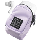 Mini Pouch | Block - Lavender mini pouch with a black label holding white wireless earbuds against a white background.