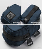 Mini Pouch | Block - Navy blue pouch showing a branded label, a rear connector strap with a snap, and a black zipper pull.