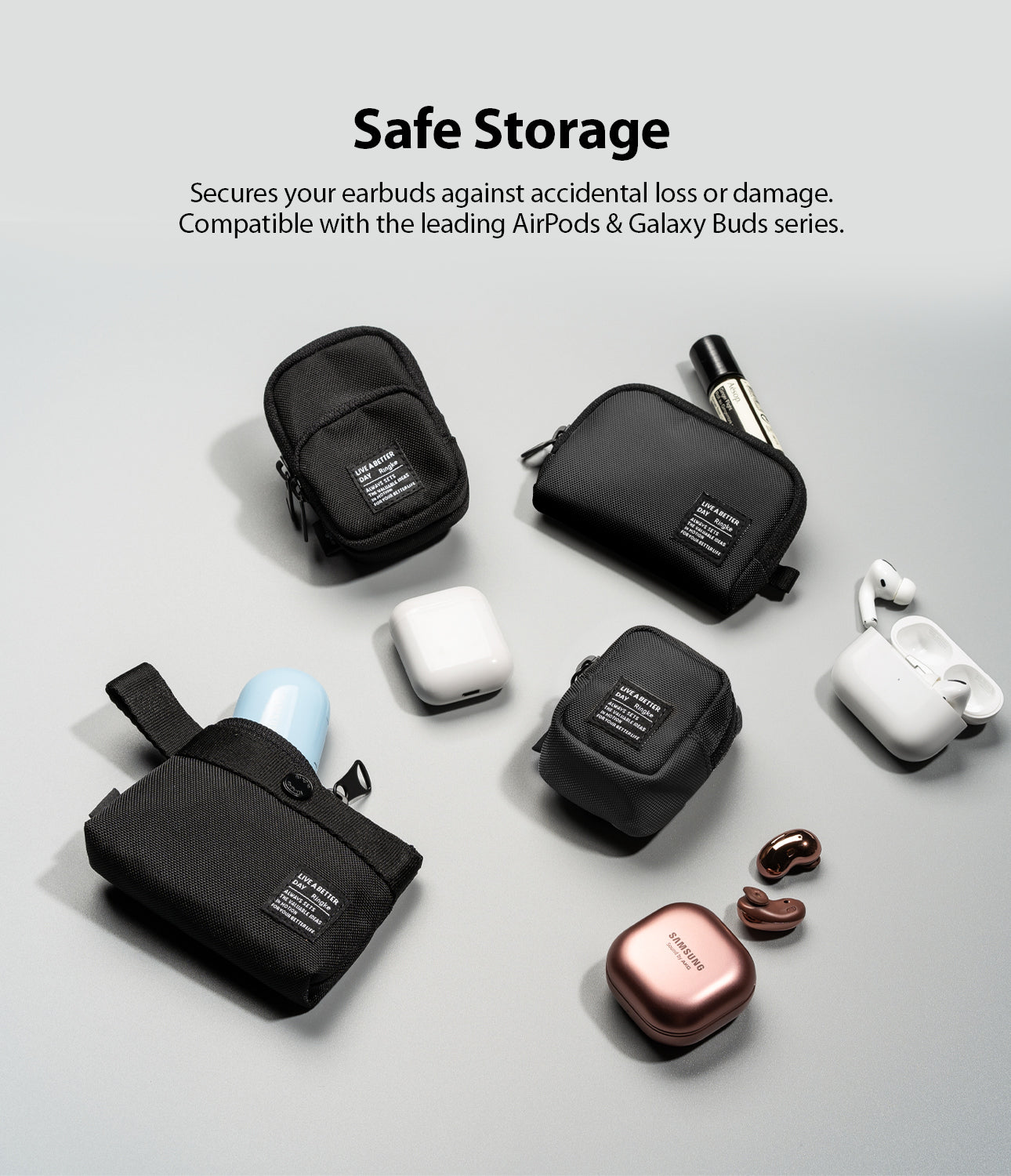 Mini Pouch | Half-Pocket - Black fabric pouches arranged with earbuds, charging cases, and small accessories on a gray surface.