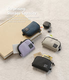 Mini Pouch | Half-Pocket - Four small pouches in blue, purple, beige, and black holding cards, earbuds, and snacks.