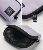 Mini Pouch | Half-Pocket - Close-ups of a lavender pouch showing the branded label, black zipper pull, and soft black lining.