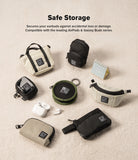 Mini Pouch | Block - Assorted small storage pouches and cases for earbuds arranged on a textured beige surface.
