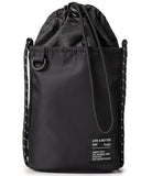 Mini Cross Bag | Bucket Bag - Black drawstring bucket bag with a white-speckled rope strap and a branded fabric patch.