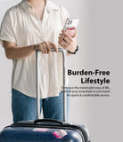 Card Holder | Magnetic Slot - Person holding a phone with a magnetic card holder attached while gripping a suitcase handle.