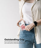 Card Holder | Magnetic Slot - Person holding a clear phone case with a credit card in the magnetic slot while sliding it into a pocket.