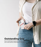 Card Holder | Magnetic Slot - Person sliding a phone with a magnetic card holder into their jeans pocket.