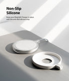 MagSafe Charger Case | Slim - A MagSafe charger next to its white, non-slip silicone protective case on a gray surface.