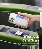 Card Holder | Magnetic Side Slot - Hand holding a phone with a magnetic card holder over a subway turnstile scanner.