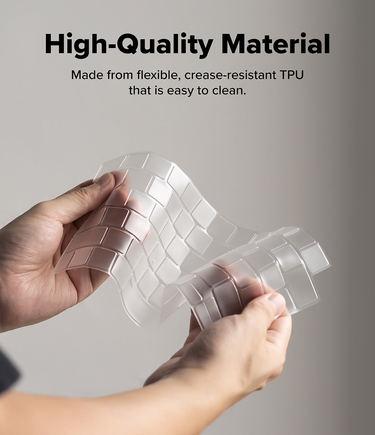 MacBook Neo Case + Protector - A person holds a flexible transparent TPU sheet to demonstrate its pliability, with text at the top reading 'High-Quality Material' and 'Made from flexible, crease-resistant TPU that is easy to clean.'.