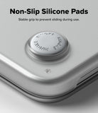 MacBook Neo | Slim - Close-up of a silver metallic device corner with a circular non-slip silicone pad, with text reading 'Non-Slip Silicone Pads' and 'Stable grip to prevent sliding during use.'.