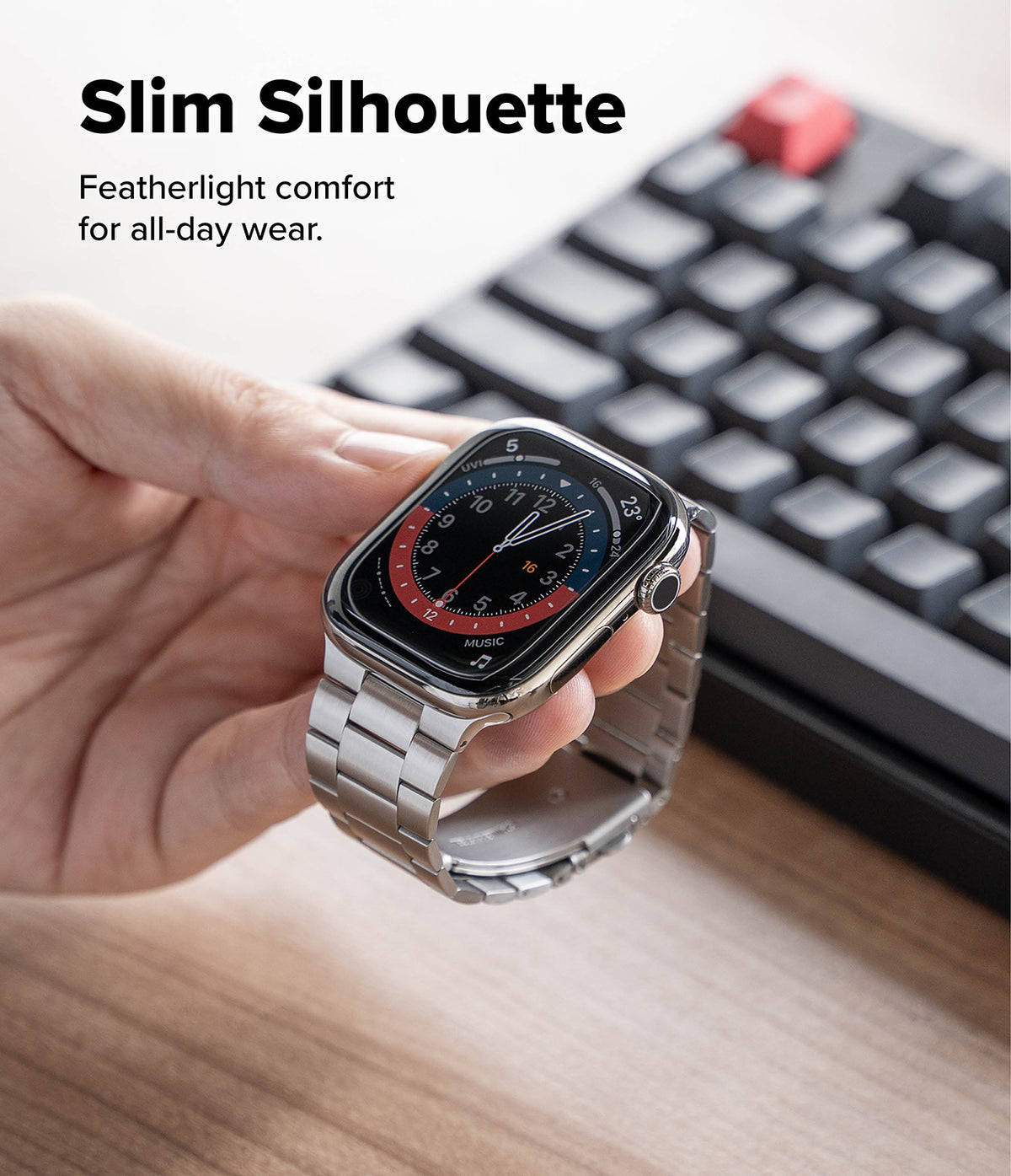 Apple Watch 49·46·45·44·42 mm | Metal One Air - Hand holding a silver metal link watch band attached to an Apple Watch.