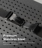Galaxy Watch Ultra 2 / 1 | Metal One Mesh - Close-up of a black stainless steel watch band clasp and mesh strap on a dark perforated surface, with text reading 'Premium Stainless Steel'.