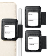 Pen Holder | Name Tag (2P) - Three black leather luggage tags with elastic straps on a white background, shown alongside a cream-colored folio and a white stylus. The tags have a white label area printed with 'Name.