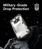 Nothing Phone (2a) / (2a) Plus Case | Fusion-X - Rugged phone case on a rocky surface with debris and military-grade text.