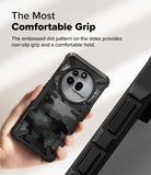 Nothing Phone (3a) Pro Case | Fusion-X - Hand holding a camo-patterned phone case with textured side grips for comfort.