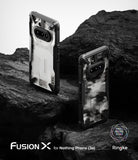 Nothing Phone (3a) Case | Fusion-X - Two rugged black Fusion-X cases for Nothing Phone (3a) displayed on dark rock.