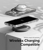 Nothing Phone (2) Case | Fusion-X - Clear phone case on a wireless charging pad with a white earbud case on top.