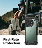 OnePlus 11 5G Case | Fusion-X - Rugged black protective phone case shown against a man in a Jeep in a sunny outdoor setting.