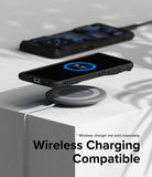 OnePlus 12R Case | Fusion-X - A OnePlus 12R in a black Fusion-X case charging wirelessly on a grey pad on a white surface.