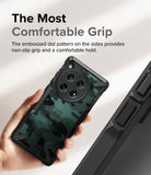 OnePlus 12 Case | Fusion-X - Hand holding a camo-patterned phone case with a textured, non-slip grip on the side edges.