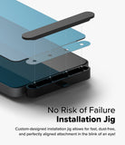 OnePlus 13R Screen Protector | Tempered Glass - Tempered glass aligning with a smartphone screen using a black plastic installation jig.