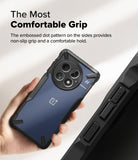 OnePlus 13 Case | Fusion-X - Hand holding a blue OnePlus 13 in a black case with textured side grips and reinforced corners.