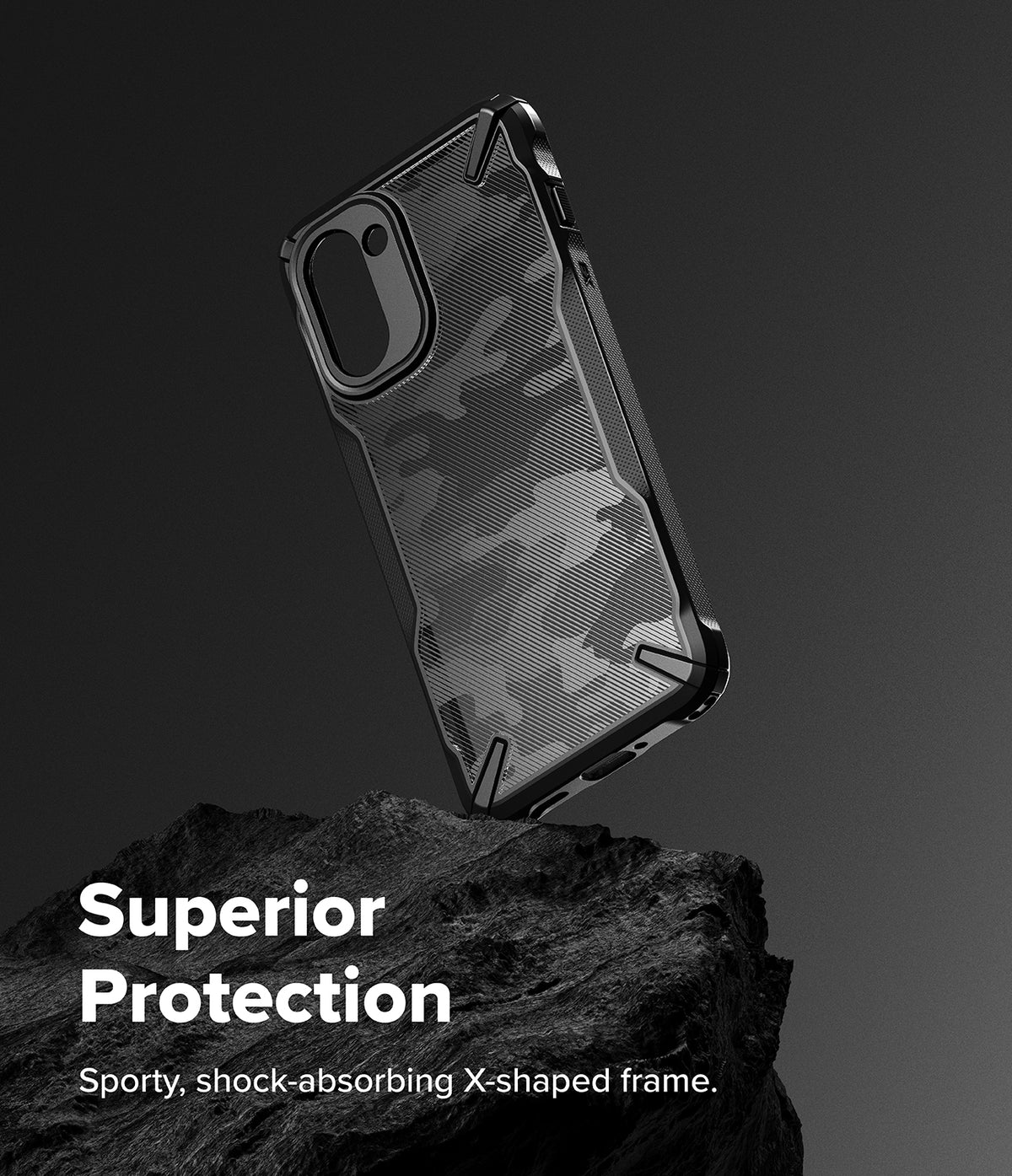 OnePlus 15R Case | Fusion-X - Black camouflage phone case with a rugged, shock-absorbing frame resting on a dark rock.