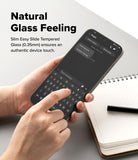 OnePlus 15 Screen Protector | Easy Slide Tempered Glass (2P) - OnePlus 15 Screen Protector - Hands holding a phone with a tempered glass screen protector while typing on the keyboard.