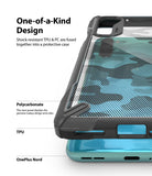 OnePlus Nord Case | Fusion-X - A clear, camo-patterned phone case with a black TPU frame being placed onto a teal OnePlus Nord.