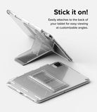 Outstanding | Tablet Stand - A clear tablet stand attached to the back of a tablet, shown both folded flat and propped up.