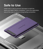 Outstanding | Tablet Stand - A purple tablet stand being applied to the back of a clear protective tablet case.