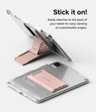 Outstanding | Tablet Stand - A rose gold foldable tablet stand attached to the back of a clear tablet case in open and closed positions.