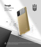 Poco M3 Case | Onyx - A gold and grey phone case floating above a textured surface with debris, highlighting military-grade protection.