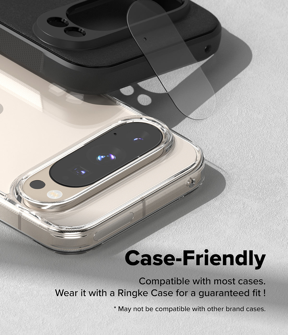 Google Pixel 10 Pro XL | Camera Glass - A clear camera lens protector hovering above a phone case on a textured surface.
