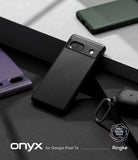 Google Pixel 7a Case | Onyx - A textured black phone case for Google Pixel 7a displayed on a dark, minimalist surface.