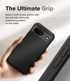Google Pixel 8a Case | Onyx - Hand holding a black phone case with a textured back and micro-dot grip pattern on the side.