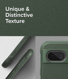 Google Pixel 8a Case | Onyx - Close-up of dark green textured phone case showing side grip details and camera cutout.