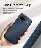 Google Pixel 8a Case | Onyx - A hand holding a dark blue phone case with a textured side grip and camera cutout.