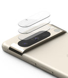 Google Pixel 8 Pro | Camera Protector Glass [3 Pack] - Three transparent glass protectors hovering above a phone camera.