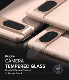Google Pixel 8 | Camera Protector Glass [3 Pack] - Tempered glass protector being applied to a rose gold Pixel 8 camera bar.